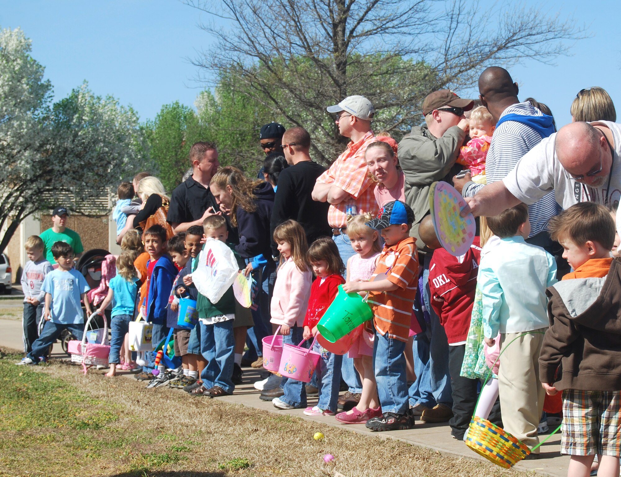 More than 200 children participated in the annual base wide Easter Egg Hunt held April 3 at the Youth Center gym and the ground around the center. Four separate age groups searched out the Easter eggs. Crafts were available to the children as well as a visit by the Easter Bunny. (U.S. Air Force photo/ Ashley Murphy)