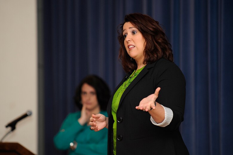 Kelly Addington (right) and Becca Tieder talk with Peterson Airmen about “it” – sexual assault – April 1 as part of Sexual Assault Awareness Month activities on Peterson Air Force Base. The women are experts on sexual assault awareness and prevention, and sexual empowerment. They encouraged Airmen to become educated on the subject, learn about base resources and keep an eye out for each other. (U.S. Air Force photo/Craig Denton)