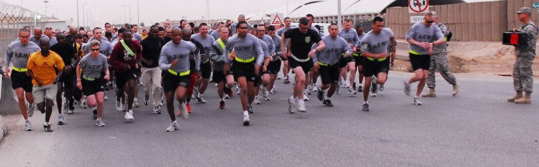 CONTINGENCY OPERATING BASE BASRA, Iraq -- Over 100 participants dash off, trying to gain the lead, at the start of this year's Molly Pitcher 5k run, held March 21.
(U.S. Army photo/Spc. Maurice A. Galloway)