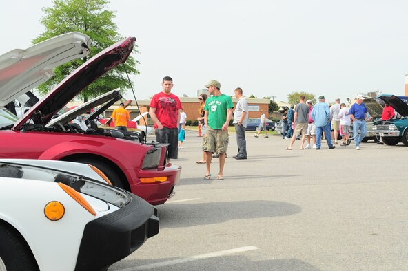 SHAW AIR FORCE BASE, S.C. -- Spectators view exhibits during a car show here April 3. The 2010 Shaw Car Show was sponsored by the Army and Air Force Exchange Service. (U.S Air Force photo/Senior Airman David Minor)