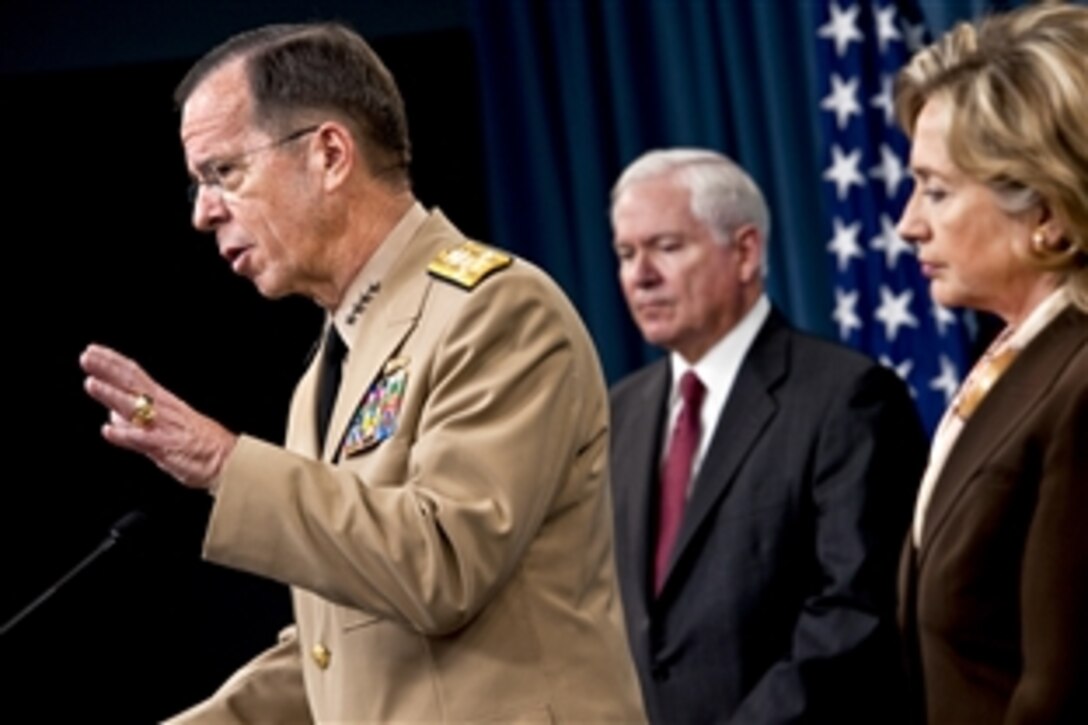 Navy Adm. Mike Mullen, chairman of the Joint Chiefs of Staff, at podium, Defense Secretary Robert M. Gates, left, and Secretary of State Hillary Rodham Clinton, right, conduct a press conference on the new Nuclear Posture Review at the Pentagon, April 6, 2010.