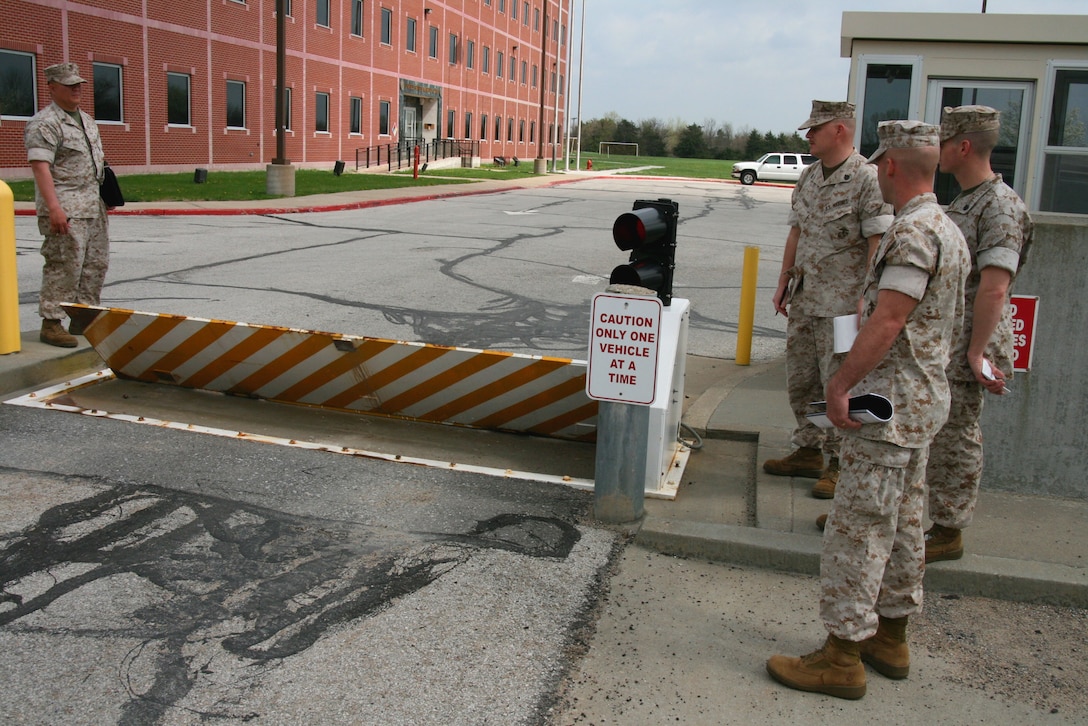 During a week-long antiterrorism force protection training course, students from various Marine Forces Reserve units assess physical security measures outside a Marine Corps Mobilization Command facility here.  This Level II anti-terrorism certification training program was designed specifically for inspector-instructor staff members who are responsible for the security of small, often remote reserve sites geographically dispersed across the United States.