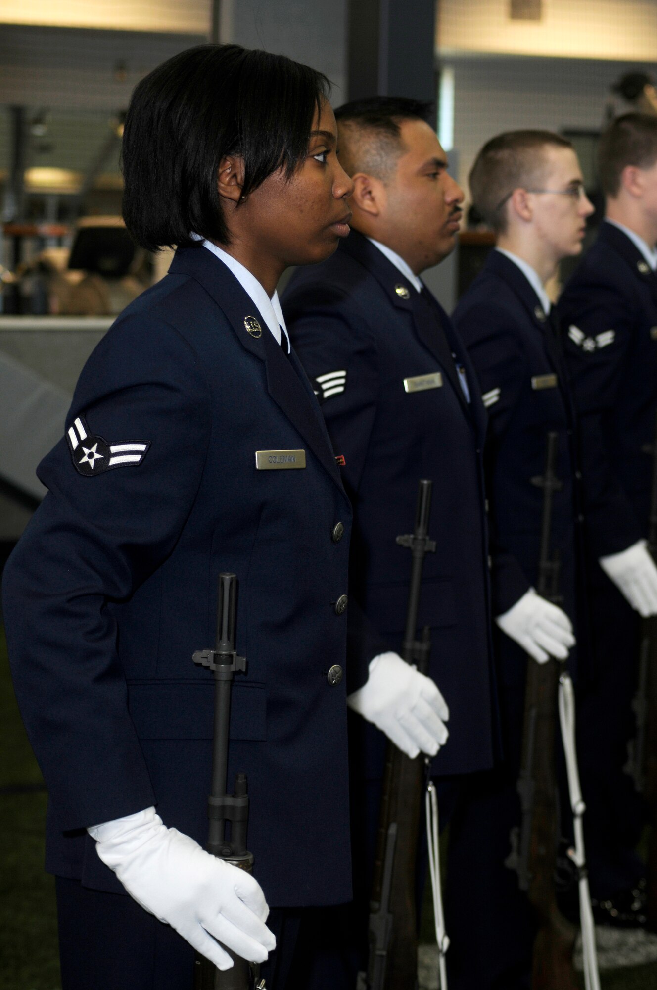 New Honor Guardsmen participate in a mock funeral during a graduation for new team members April 5, 2010, Eielson Air Force Base, Alaska.  The Eielson Honor Guard performs color guard details, provides military honors at active duty, retiree and veteran funerals and participate in local military events downtown.  (U.S. Air Force photo/Staff Sgt. Tia Wilson)