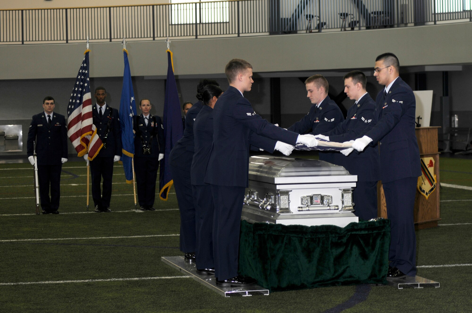 New Honor Guardsmen participate in a mock funeral during a graduation for new team members April 5, 2010, Eielson Air Force Base, Alaska.  The Honor Guard hosts a graduation for new recruits after their Honor Guard week of training on the team.  (U.S. Air Force photo/Staff Sgt. Tia Wilson)