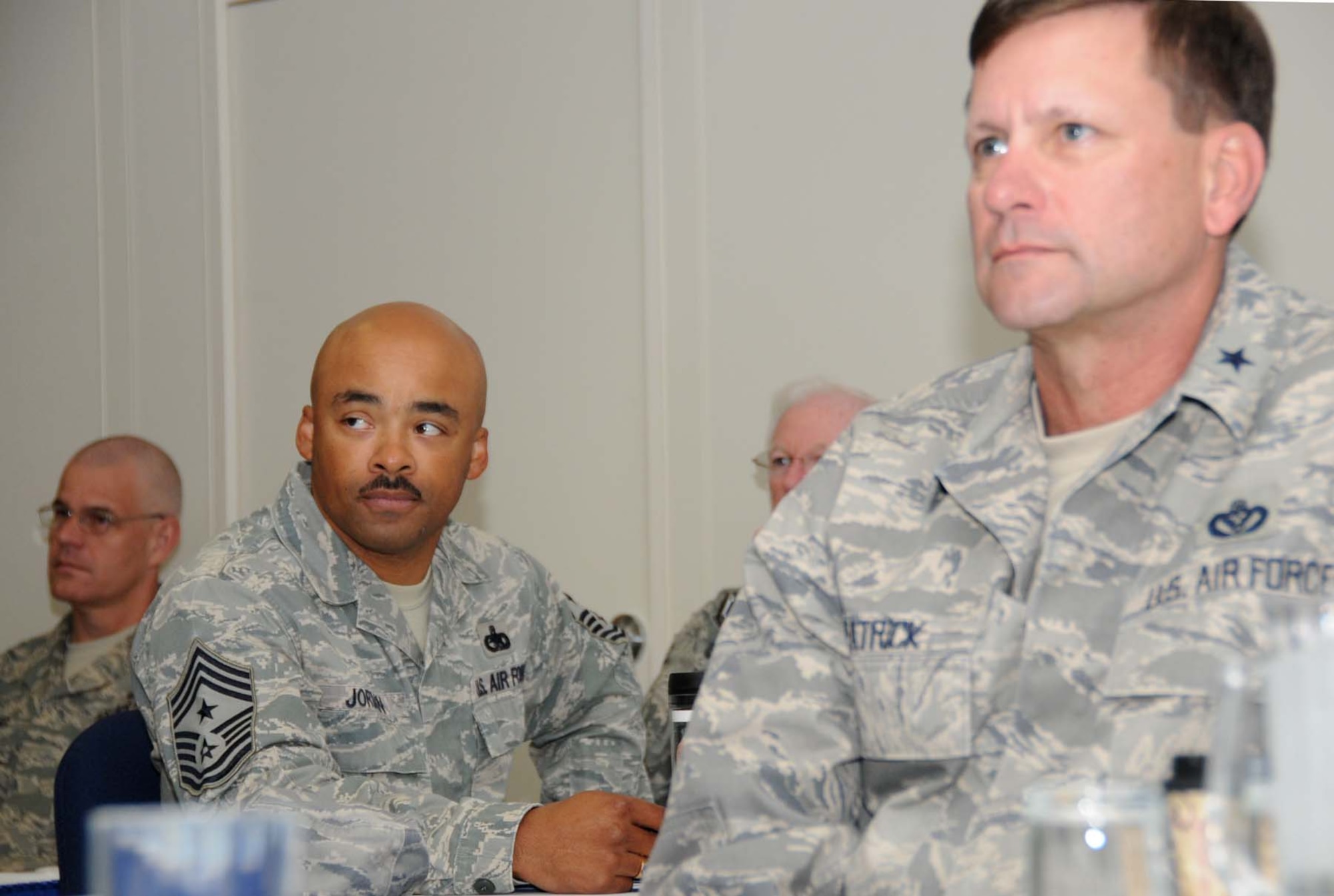 Chief Master Sgt. Linus Jordan, 2nd Air Force command chief, and Brig. Gen. Leonard Patrick, commander of the 502nd Air Base Wing in San Antonio, listen to one of the conference briefings March 29.  (U.S. Air Force photo by Kemberly Groue)