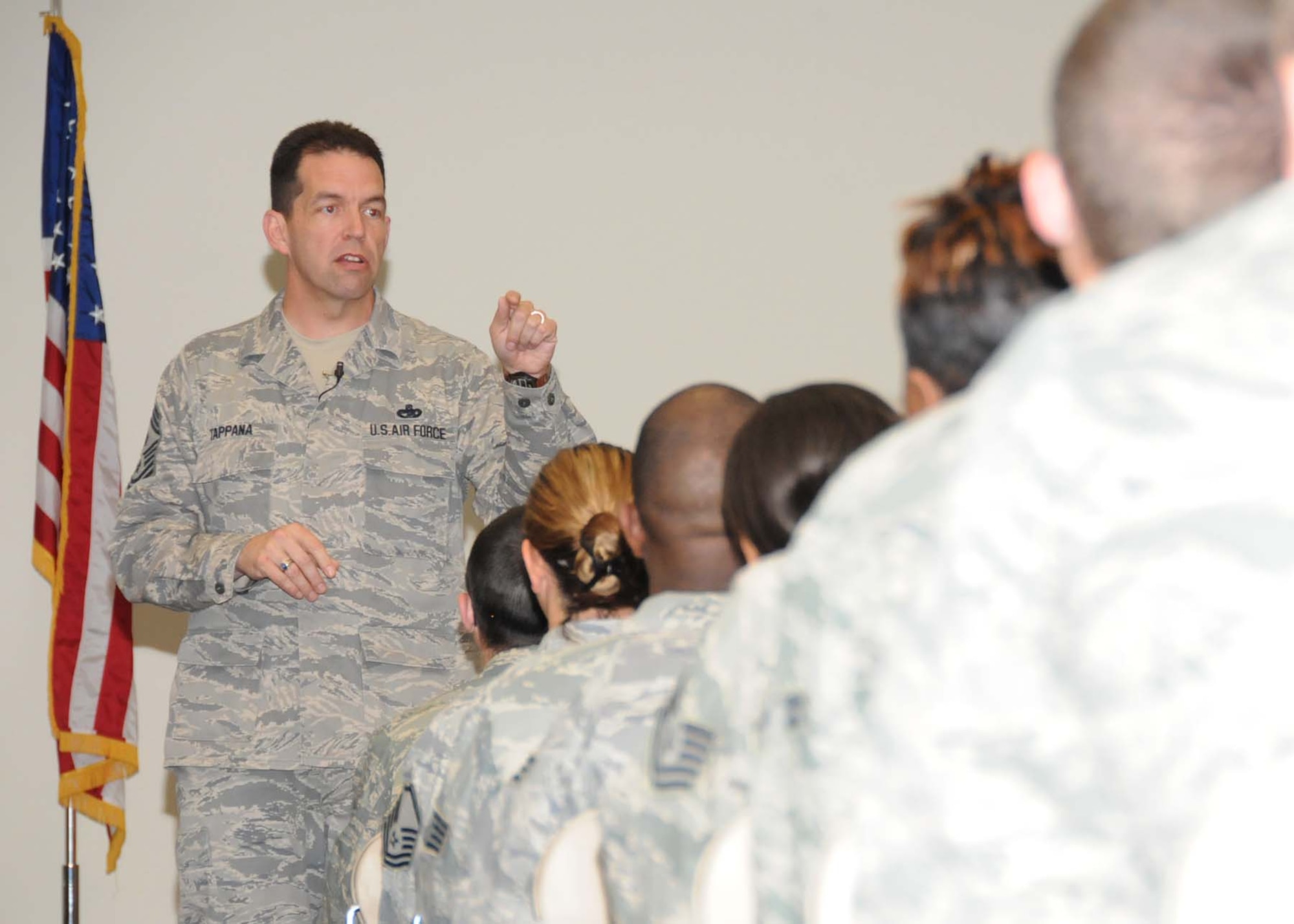 Chief Master Sgt. Robert Tappana, AETC command chief,  speaks at an enlisted call at the Roberts Consolidated Aircraft Maintenance Facility March 30.  (U.S. Air Force photo by Kemberly Groue)
