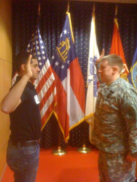 Alexander M. Lopez, currently an Air Force Basic Military Training attedee at Lackland Air Force Base, Texas, takes an Oath of Enlistment at the Military Entrance Processing Command (MEPS) station in Atlanta, Ga. (Courtesy photo)