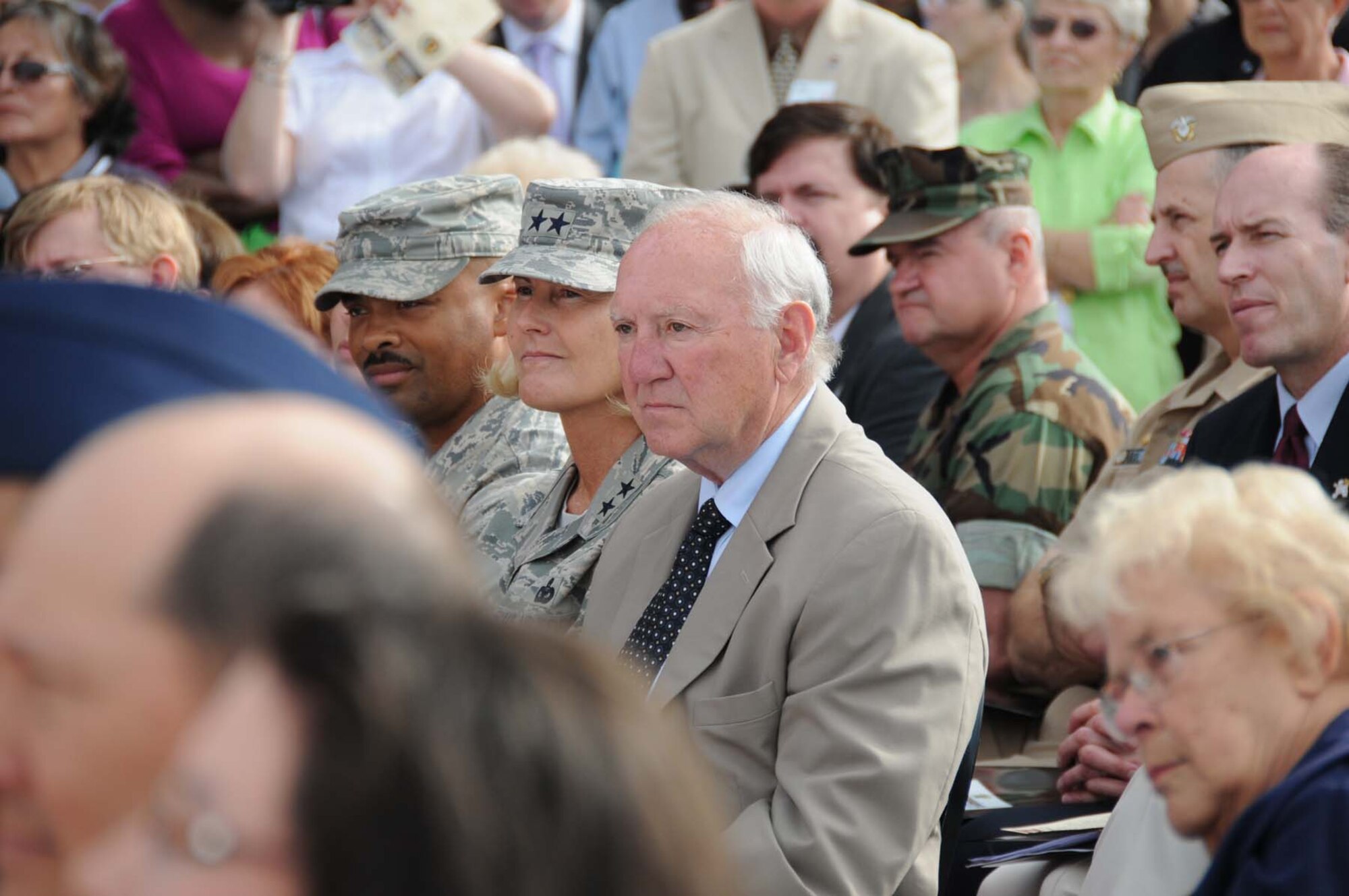 From left, Chief Master Sgt. Linus Jordan, 2nd Air Force command chief; Maj. Gen. Mary Kay Hertog, 2nd Air Force commander, and Biloxi mayor A.J. Holloway attended the ribbon-cutting ceremony for Keesler's new shopping complex April 6.  The $60 million facility includes a commissary, base exchange, pharmacy, food court, optical shop, GNC, a variety of concessionaires and beauty, nail and barber shops.  (U.S. Air Force photo by Kemberly Groue)