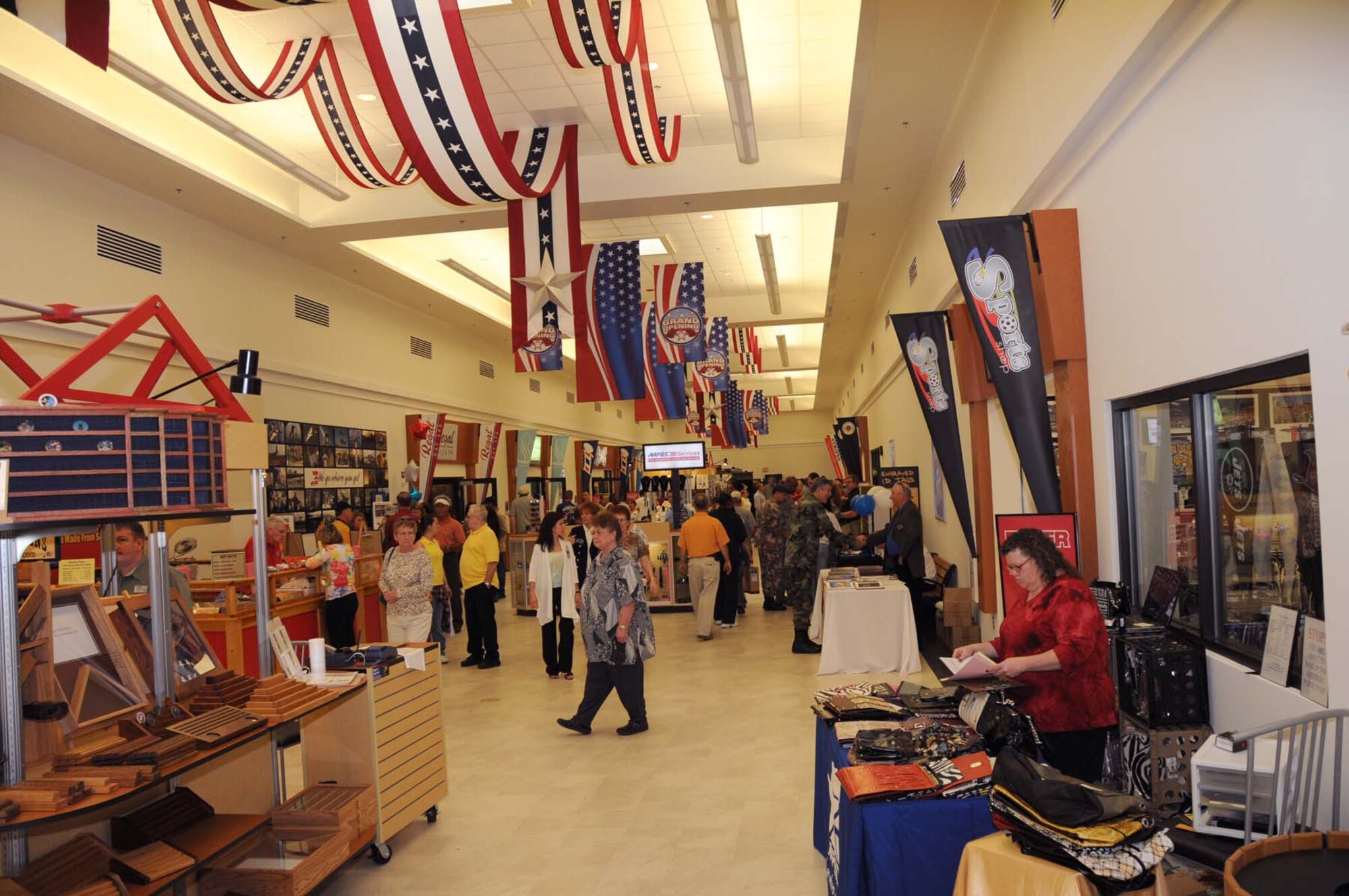 The new base exchange is linked to the food court by a walkway filled with shops and vendors.  The $60 million shopping complex that opened April 6 also includes a new commissary and pharmacy.  (U.S. Air Force photo by Kemberly Groue)