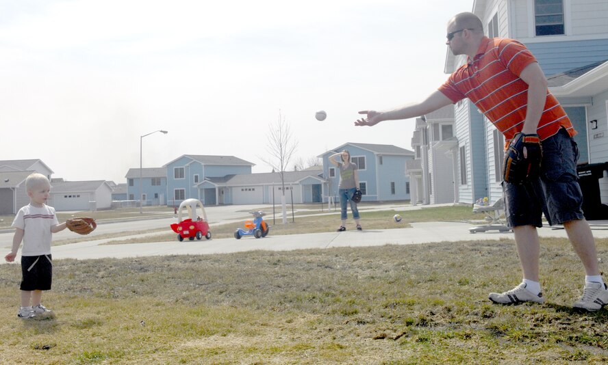 MINOT AIR FORCE BASE, N.D. -- Sunshine and a child on playground equipment create shadows at the youth center April 5. With the recent warm, dry weather, nearly all of the winter snow has melted and the base playgrounds are drying out, providing opportunities for kids and families to enjoy outdoor activities again. (U.S. Air Force photo by Laurie Arellano)