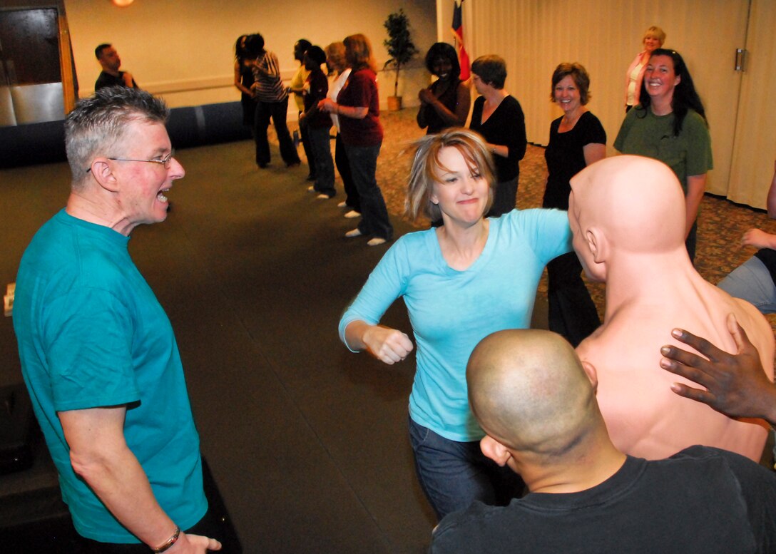 Attendees line up to learn some self-defense options at Speak Up and Speak Out in the Midwestern State University Clark Student Center April 6, 2010.  Sheppard Air Force Base and MSU worked together and brought an entire day of workshops to help prevent sexual assault.  Topics included self-defense for men and women, by-stander intervention, sexual harrassment, online predators, violence and others.  (U.S. Air Force photo/Harry Tonemah)