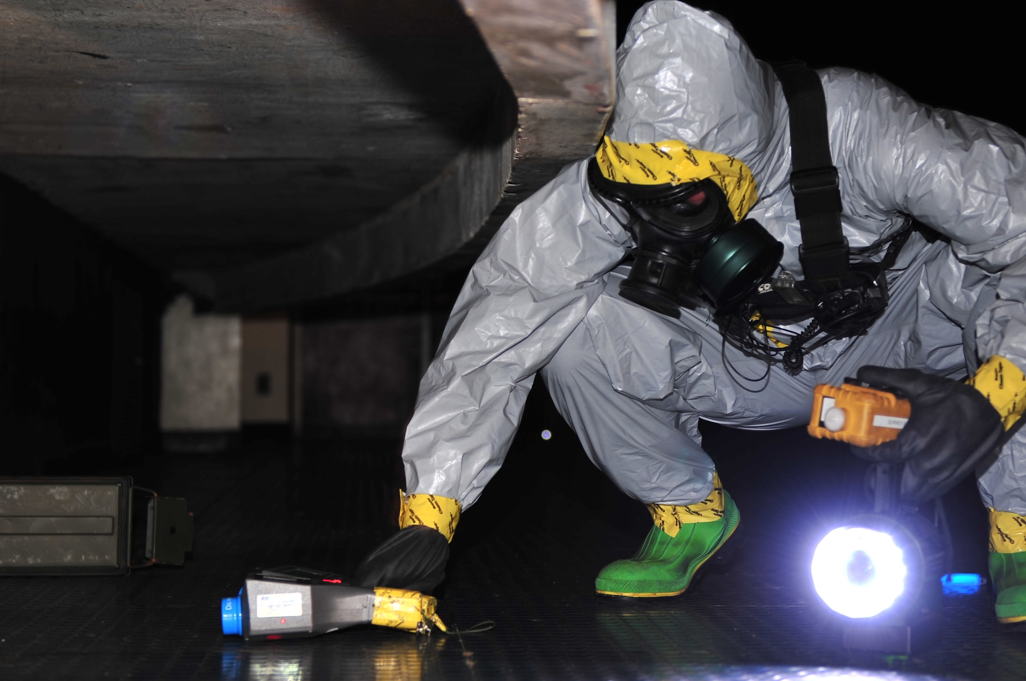 SEYMOUR JOHNSON AIR FORCE BASE, N.C. -- Tech. Sgt. Lee Kuberacki checks contamination readings during a chemical, biological, radiological and nuclear hazard exercise here, March 30, 2010. The reading device uses samples of the air to determine the contamination ratio. Sergeant Kuberacki, 42nd Civil Support Team North Carolina National Guard surveyor, is from Winterville. (U.S. Air Force photo/Senior Airman Rae Perry)