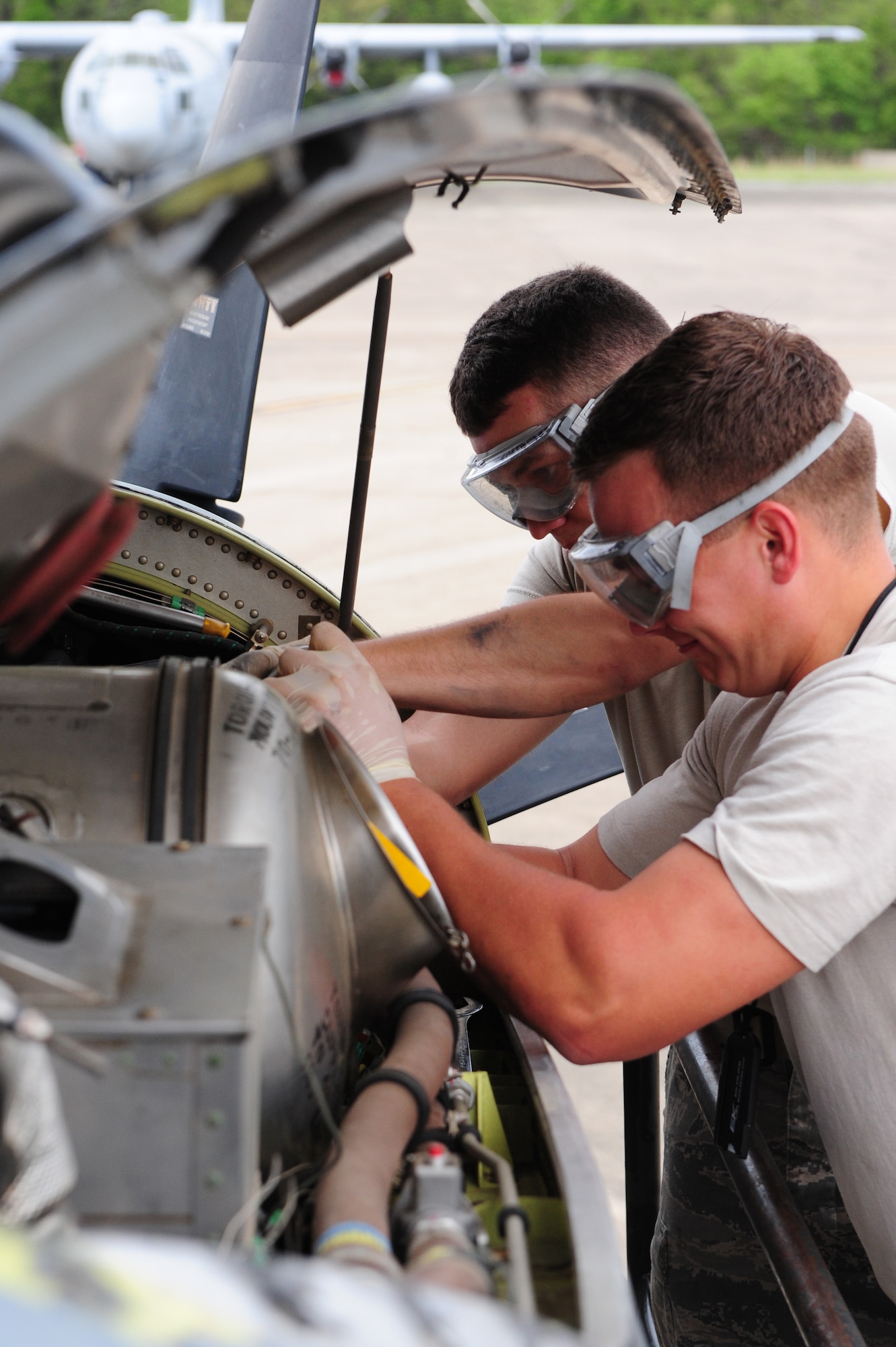 Senior Airman Michael Matinchek and Airman 1st Class Michael Schmidt, both 19th Aircraft Maintenance Squadron hydraulics maintainers, change an engine pump on a C-130 J-model aircraft April 7 on the flightline. The squadron’s Airmen are vital assets to missions at home and throughout deployed locations and were recognized at the Air Mobility Command and Air Force-levels for their hard work and professionalism. (U.S. Air Force photo by Senior Airman Steele C. G. Britton)