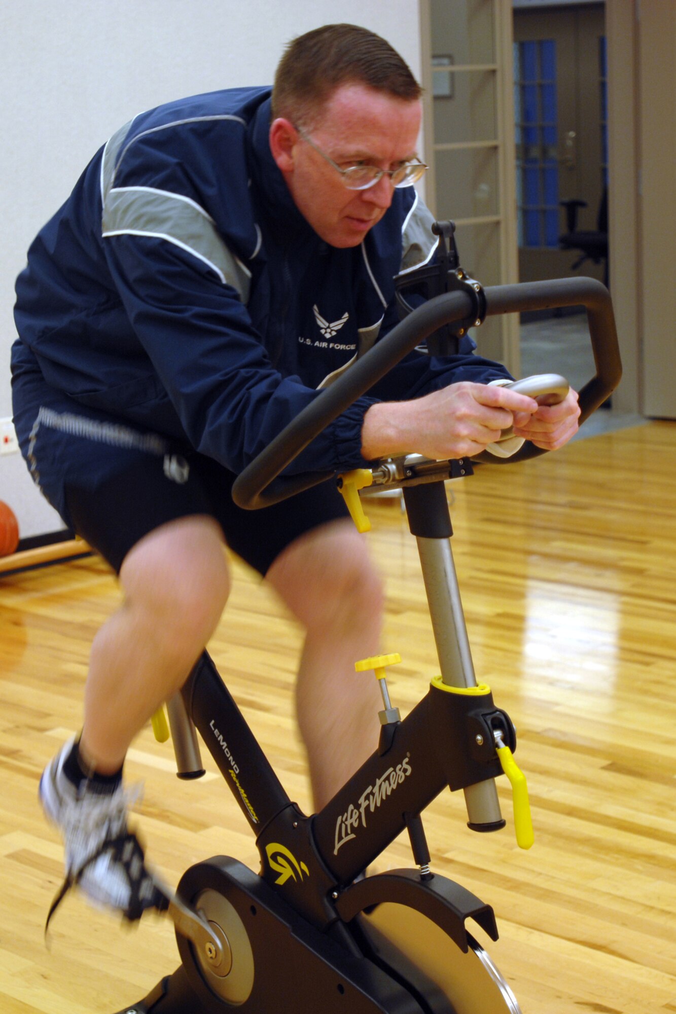 GRISSOM AIR RESERVE BASE, Ind. -- During the winter months Tech. Sgt. Allen Walden, 434th Aircraft Maintenance Squadron guidance and control specialist, stays in shape by riding a stationary bike. Sergeant Walden plans on cycling 5,000 miles during 2010. (U.S. Air Force photo/Senior Airman Carl Berry)