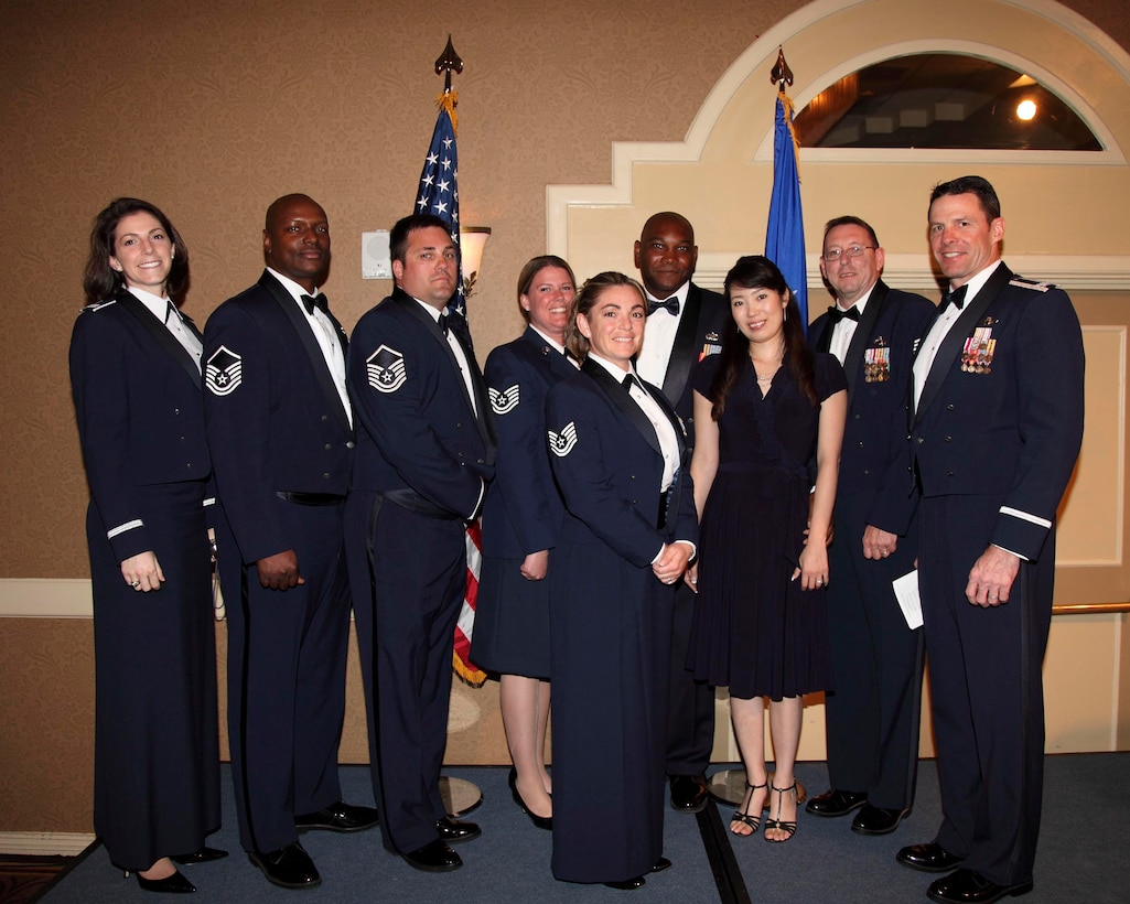Members of the 80th Flying Training Wing pose for a photo March 31 following the graduation of a few of its members from the Non-Commissioned Officers Academy at Lackland Air Force Base, Texas. Tech. Sgts. Kenyun Willis, Mary Price and Gypsie King were graduates from the 80th FTW. Those pictured, from left to right, include: Capt. Cheryl Buehn, 80th FTW executive officer; Master Sgt. Frankie Moore, 80th FTW quality assurance evaluator; Master Sgt. Jon George, 80th FTW quality assurance evaluator; Sergeant Price, NOIC of host aviation resource management; Sergeant Willis, NCOIC of wing executive services, and his wife, Mio; Chief Master Sgt. Norm Thierolf, 80th FTW superintendent; Col. George Menker, 80th FTW vice commander; and, in the front, Sergeant King, 80th FTW quality assurance inspector. (U.S. Air Force photo/Lt. Col. Ternell Washington)