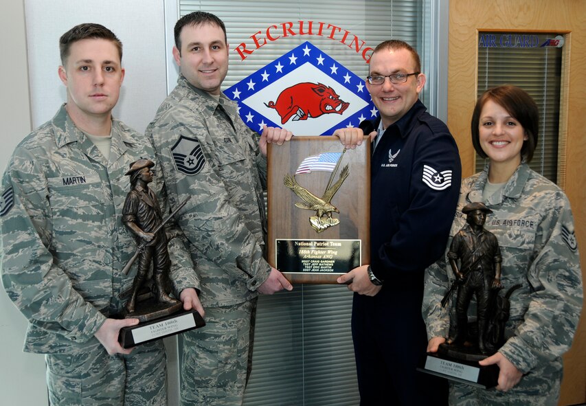 From left: Tech Sgt. Eric Martin, Master Sgt. Craig Gardner, Tech Sgt. Jeff Mathews and Staff Sgt. Jean Jackson. The quartet comprises the 188th Fighter Wing Recruiting Office, which was named the Air National Guard's top recruiting office nationally for fiscal year 2009. The office received the Patriot Team Award at the ANG's annual Recruiting and Retention awards banquet held in Dallas, Feb. 23. Martin was also named the Rookie Production Recruiter of the Year at the national level for FY 2009 at the banquet. (U.S. Air Force photo by Senior Master Sgt. Dennis Brambl/188th Fighter Wing Public Affairs)

