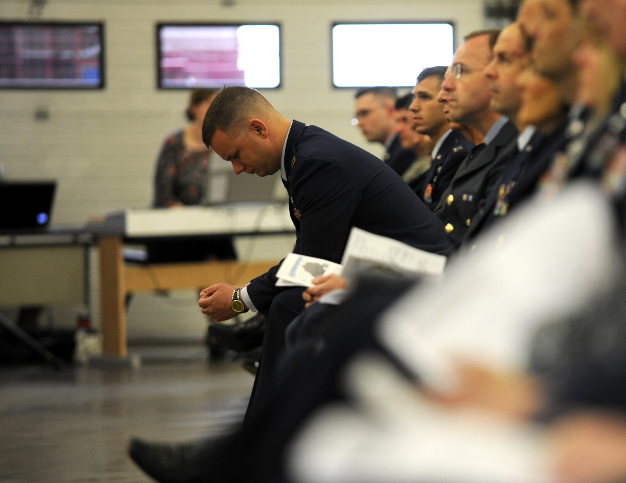 RAF MILDENHALL, England – Capt. Scott Wilcox, 48th Civil Engineer Squadron, attends a memorial service for his wife, Capt. Jenna Wilcox, 100th Civil Engineer Squadron, who died April 1 from injuries sustained in a vehicle-related accident in Scotland March 27.  Both captains had recently returned from deployments to Afghanistan, where Capt. Wilcox was awarded the Bronze Star for her actions during a roadside bomb attack.  (U.S. Air Force photo/Staff Sgt. Jerry Fleshman)