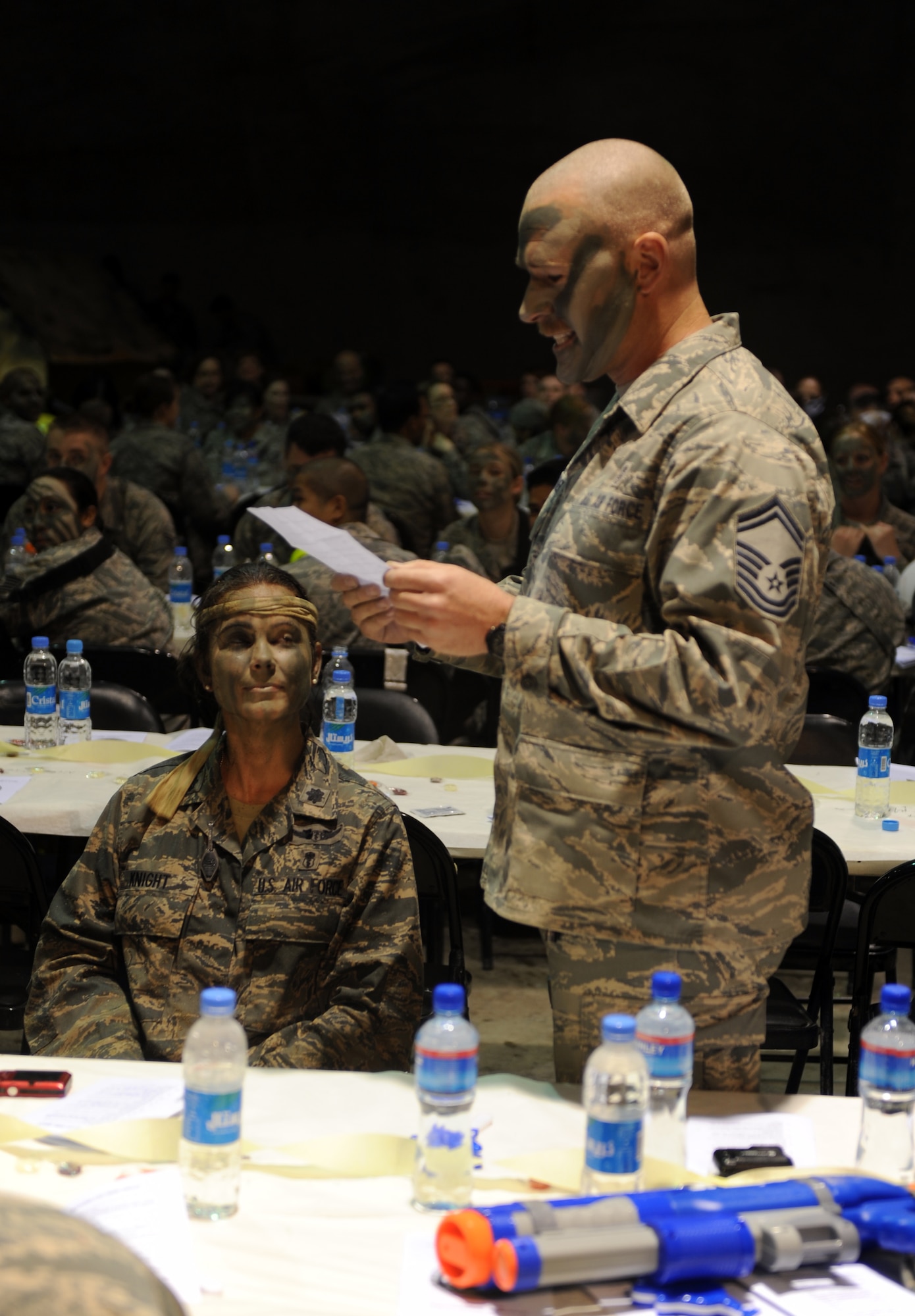 Senior Master Sgt. Joe Steiner, 455th Expeditionary Medical Group/Task Force Medical East, medical operations superintendent, addresses the mess with a point of order during the first ever combat dining in here, March 31, 2010. Sergeant Steiner is deployed from McGuire Air Force Base, N.J. and is a native of Canon City, Col. (U.S. Air Force photo by/ Staff Sgt. Richard Williams)