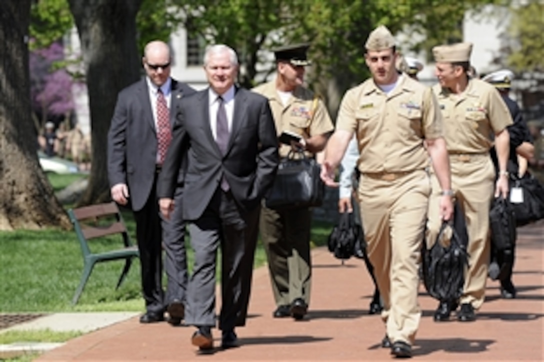 Defense Secretary Robert M. Gates walks to King Hall to have lunch with the midshipmen at the U.S. Naval Academy in Annapolis, Md., April 7, 2010.  