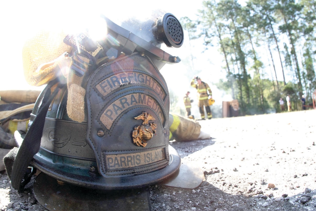 A firefighters helmet sits outside of the flashover simulator just after firefighters have completed their first round of training. PIFR conducts flashover training at least four times a year to keep their skills sharp.