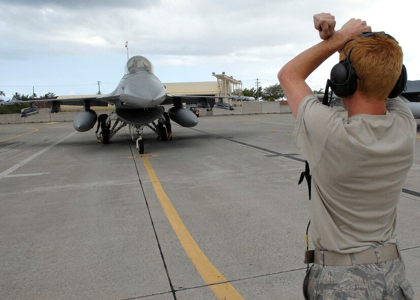 Col. Samuel (Sam) Black, Director of Operations, 100th Fighter Squadron, Air National Guard Alabama,  and Lee Webber, President and Publisher for The Honolulu Advertiser, taxis in the after an incentive flight,  in a F- 16 Falcon, on the flightline, Joint Base Pearl Harbor Hickam, Hawaii, Apr. 7, 2010. (U.S. Air Force photo/Tech. Sgt. Jerome S. Tayborn)