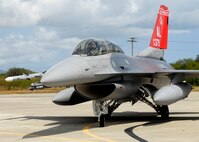 Col. Samuel (Sam) Black, Director of Operations, 100th Fighter Squadron, Air National Guard Alabama,  and Lee Webber, President and Publisher for The Honolulu Advertiser, taxis for takeoff, in a F- 16 Falcon, on the flightline, Joint Base Pearl Harbor Hickam, Hawaii, Apr. 7, 2010. (U.S. Air Force photo/Tech. Sgt. Jerome S. Tayborn)