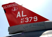 Lee Webber, President and Publisher for The Honolulu Advertiser, received an incentive flight, from the 100th Fighter Squadron, TDY from Montgomery, Alabama, on this F-16 Falcon, which is dedicated to the legacy of the Tuskegee Airmen, America? first black military airmen. (U. S. Air Force photo/Tech. Sgt. Jerome S. Tayborn)
