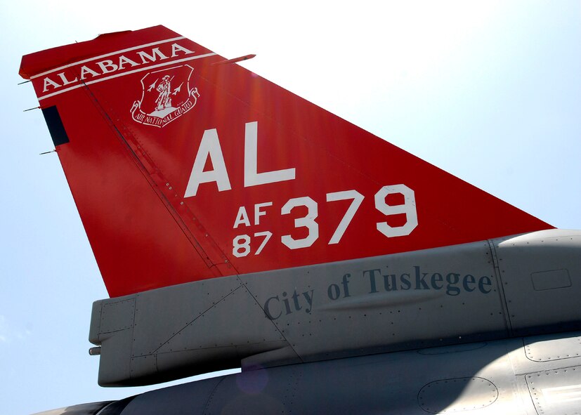 Lee Webber, President and Publisher for The Honolulu Advertiser, received an incentive flight, from the 100th Fighter Squadron, TDY from Montgomery, Alabama, on this F-16 Falcon, which is dedicated to the legacy of the Tuskegee Airmen, America? first black military airmen. (U. S. Air Force photo/Tech. Sgt. Jerome S. Tayborn)