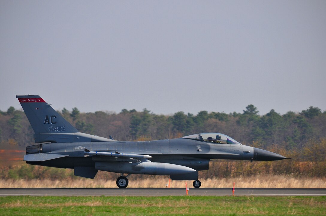 A U.S. Air Force F-16C Fighting Falcon piloted by Lt. Col. John Bratun rockets down the runway at Atlantic City International Airport on April 8th, 2010.  Colonel Bratun is assigned to the 119th Fighter Squadron.  (U.S. Air Force photo/Staff Sgt. Matt Hecht) 