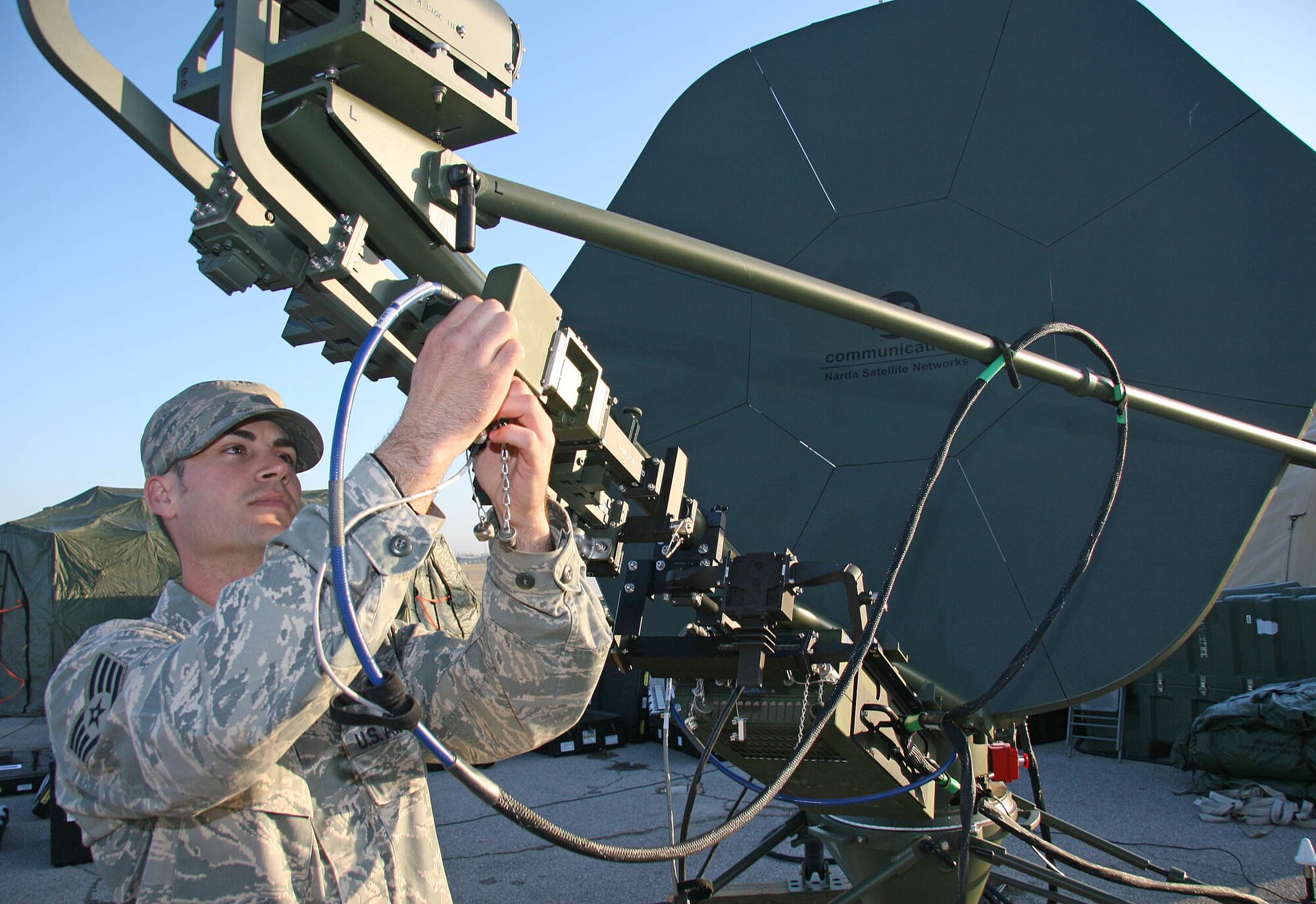 Staff Sgt. Jarod Williams sets up bare base communications equipment March 18 during a training mission. The Airmen with the 3rd Combat Communications Group will compete with 16 fellow 3rd Herders in the upcoming Guardian Challenge, which will be held at Tinker April 16-19.