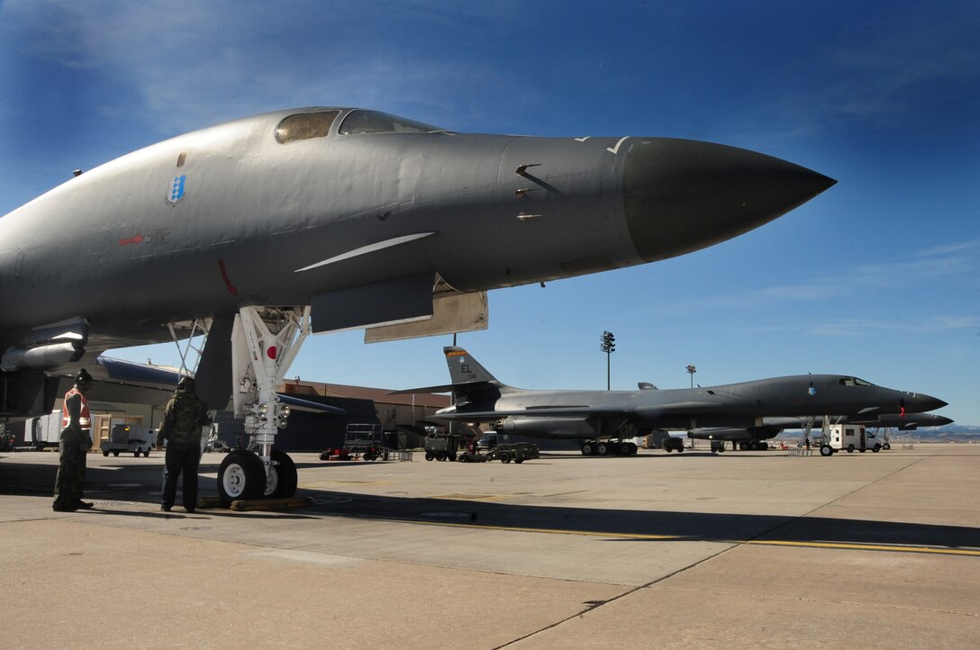 ELLSWORTH AIR FORCE BASE, S.D. -- B-1B Lancers undergo maintenance and checks on the flightline before take off, April 8.  The B-1 is a highly versatile, multi-mission weapon system. The B-1B's synthetic aperture radar is capable of tracking, targeting and engaging moving vehicles as well as self-targeting and terrain-following modes. (U.S. Air Force photo/Airman 1st Class Anthony Sanchelli)

