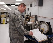 Staff Sgt. Ryan Soliday, 60th Maintenance Squadron, works in the Precision Measurement Equipment Laboratory recently. PMEL members test measurement and diagnostic equipment for 208 work centers on base, across the state and for several bases across the country. As the lead technician in the physical/dimensional section, Sergeant Soliday's duties range from calibration, troubleshooting and repair, to training and supervisory roles. (U.S. Air Force photo/Senior Airman Anthony Ross)
