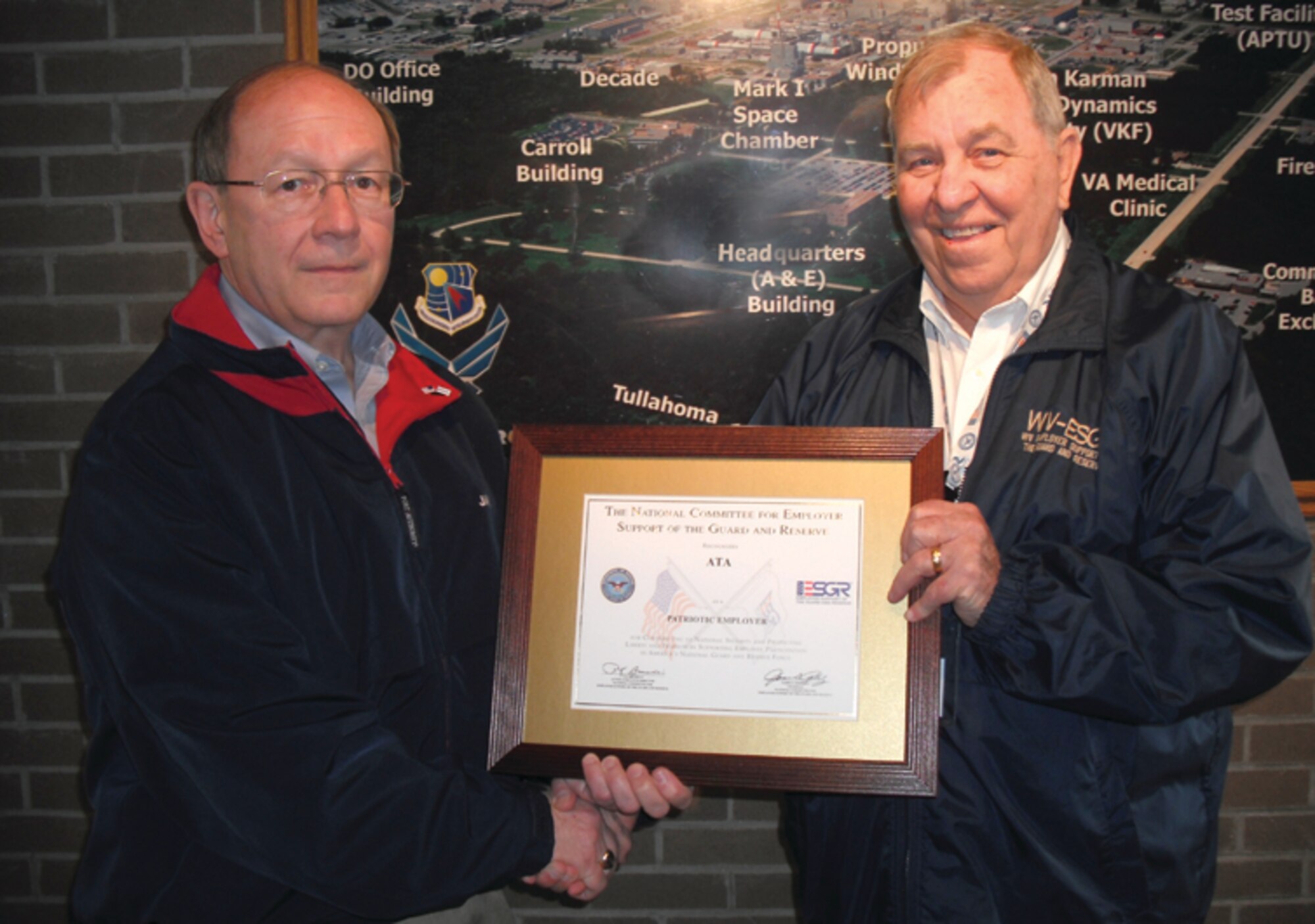Aerospace Testing Alliance (ATA) Support Services Director Pat Eagan, left, accepts on behalf of ATA the National Committee Employer Support of the Guard and Reserve (ESGR) award from Committee Member of the of the Tennessee Committee Bob Beatty. (Photo provided)