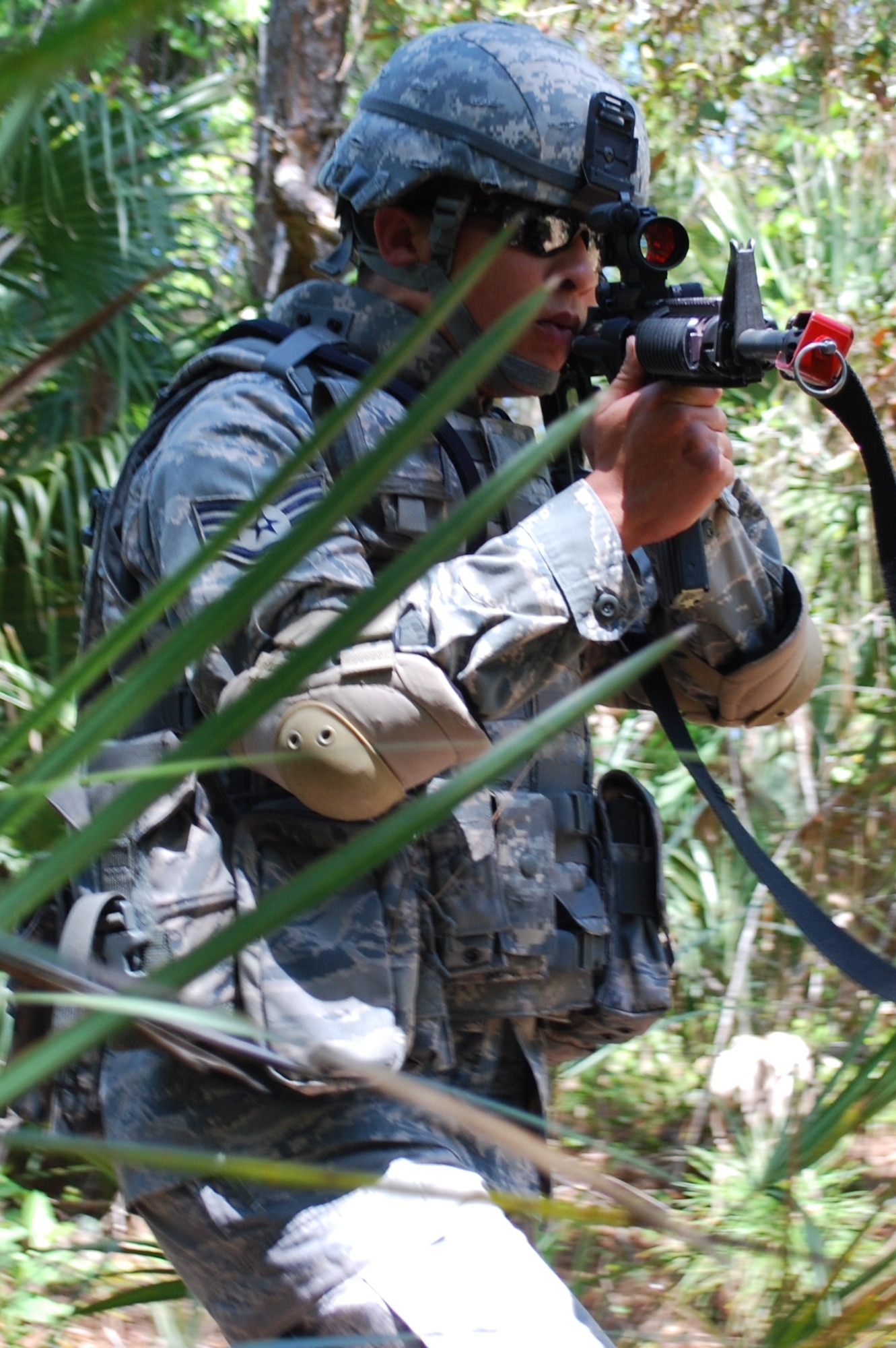 Staff Sgt. Justin Sonnier of the 45th Security Forces Squadron practices security
maneuvers Tuesday at Malabar Training Annex. Sergeant Sonnier is a member of the 45th Space Wing's Security Forces team for the 2010 Guardian Challenge. (U.S. Air Force photo/Daniel Wade)