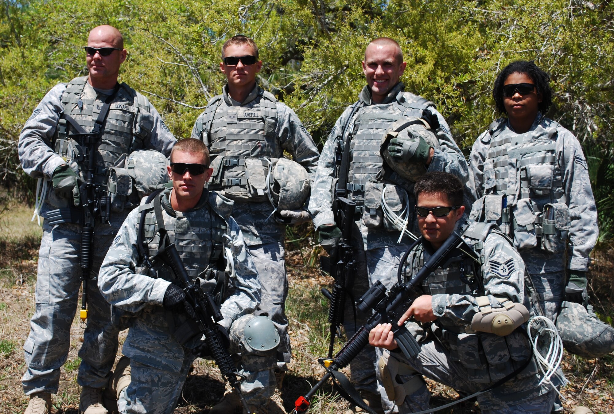 The 45th Space Wing Guardian Challenge Security Forces team, comprised of (top row left to right) Tech. Sgt. Steven Conard, Airman 1st Class Christopher Averill, Senior Airman Patrick Allen, (bottom row left to right) Airman 1st Class Kinesha Greenlee, Senior Airman Jered Dauterman and Staff Sgt. Justin Sonnier, following a day's training at Malabar Training Annex. (U.S. Air Force photo/Daniel Wade)