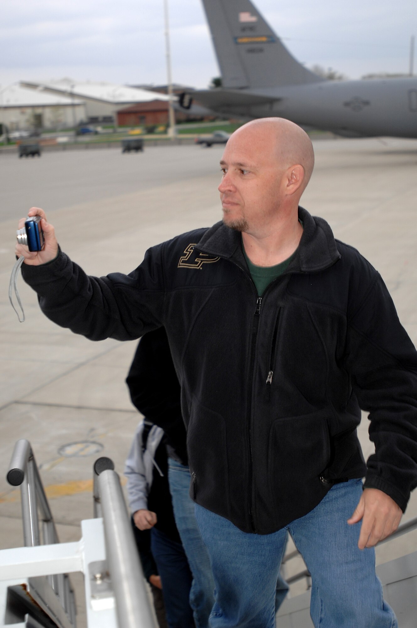 GRISSOM AIR RESERVE BASE, Ind. -- Ron James, an employer from the Indianapolis area, takes a moment to capture a photo of a KC-135R Stratotanker he is about to board during an employer orientation flight held here recently. Mr. James, along with other employers of 434th Air Refueling Wing personnel, visited the base and received a first-hand look at the 434th Air Refueling Wing, including an aerial refueling mission. (U.S. Air Force photo/Tech. Sgt. Mark R. W. Orders-Woempner)