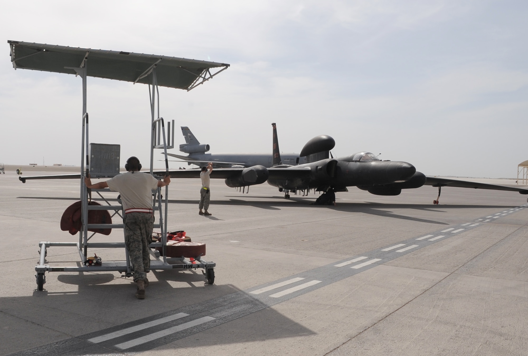 Maintenance Airmen from the 380th Expeditionary Aircraft Maintenance Squadron Dragon aircraft maintenance unit begin the recovery of a U-2 Dragon Lady from the 99th Expeditionary Reconnaissance Squadron at non-disclosed base in Southwest Asia after it completed a combat mission in the U.S. Central Command area of responsibility April 5, 2010. The U-2 is deployed from Beale Air Force Base, Calif. The 99th ERS, as part of the 380th Air Expeditionary Wing, supports operations Iraqi Freedom and Enduring Freedom and the Combined Joint Task Force-Horn of Africa. (U.S. Air Force Photo/Master Sgt. Scott T. Sturkol/Released)
