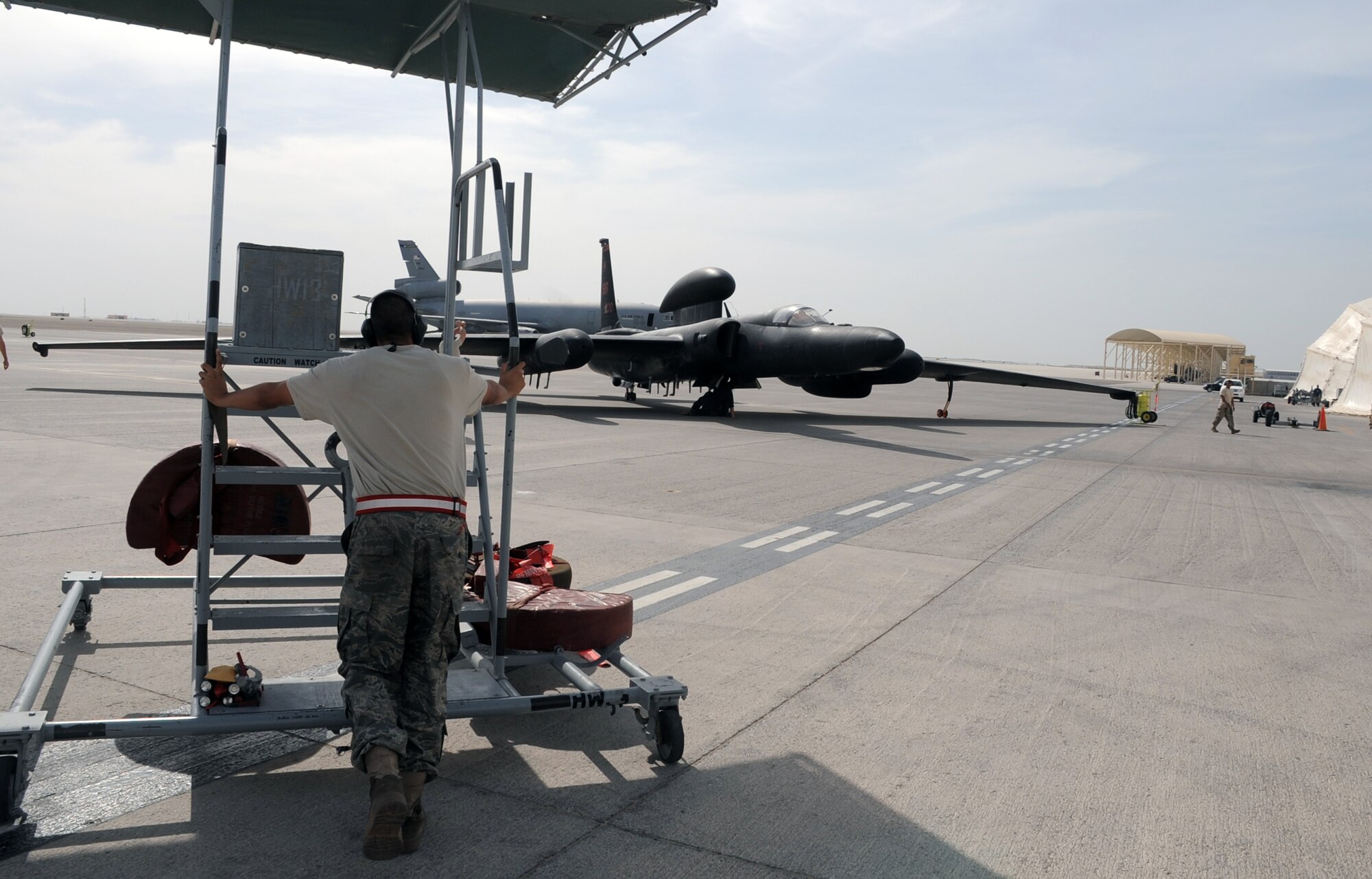Maintenance Airman from the 380th Expeditionary Aircraft Maintenance Squadron Dragon aircraft maintenance unit begin the recovery of a U-2 Dragon Lady from the 99th Expeditionary Reconnaissance Squadron at non-disclosed base in Southwest Asia after it completed a combat mission in the U.S. Central Command area of responsibility April 5, 2010. The U-2 is deployed from Beale Air Force Base, Calif. The 99th ERS, as part of the 380th Air Expeditionary Wing, supports operations Iraqi Freedom and Enduring Freedom and the Combined Joint Task Force-Horn of Africa. (U.S. Air Force Photo/Master Sgt. Scott T. Sturkol/Released)
