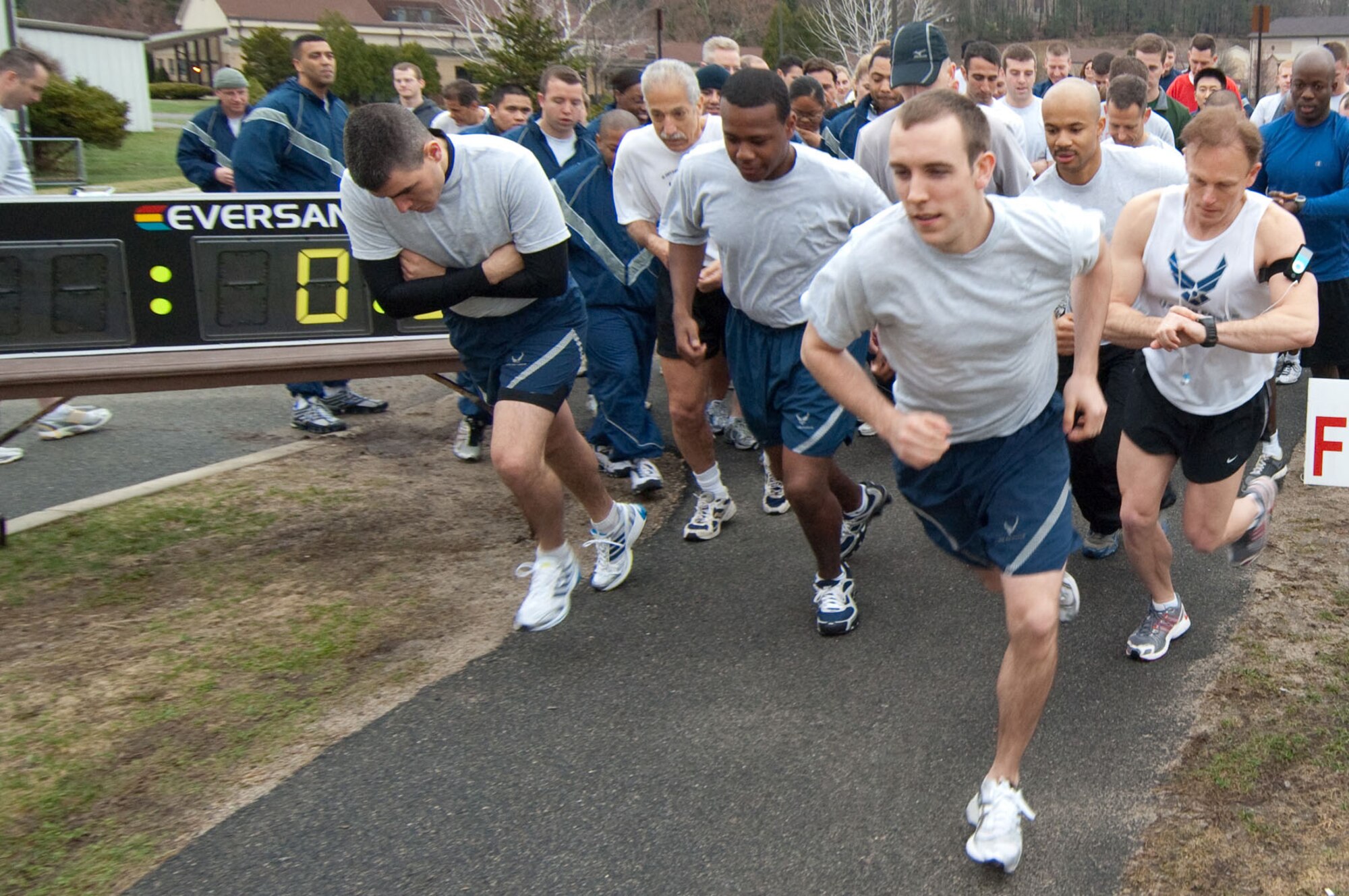 HANSCOM AIR FORCE BASE, Mass. - Runners take off during the Air Force Assistance Fund 5K Fun Run. The run, which took place on April 1, was an event open to all Hanscom personnel to raise awareness of the AFAF. (U.S. Air Force photo by Rick Berry)