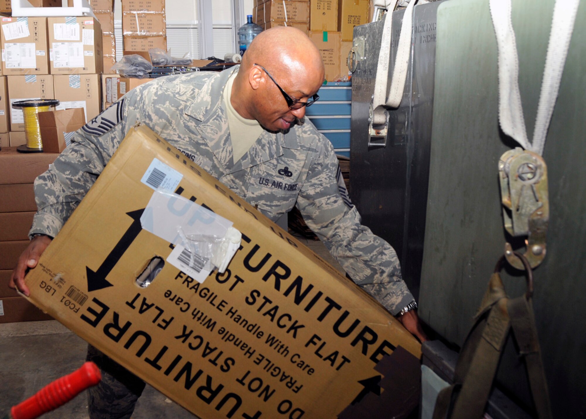 Senior Master Sgt. Steven Higgins, 48th Fighter Wing Inspections Readiness and Exercises superintendent, checks his emails at RAF Lakenheath, England, March 9 after returning from the Senior NCO Academy.  Sergeant Higgins was recognized as the senior NCO of the Year for United States Air Forces in Europe and now will compete for the 12 Outstanding Airmen of the Year. (U.S. Air Force photo by Airman 1st Class Eboni Knox) 