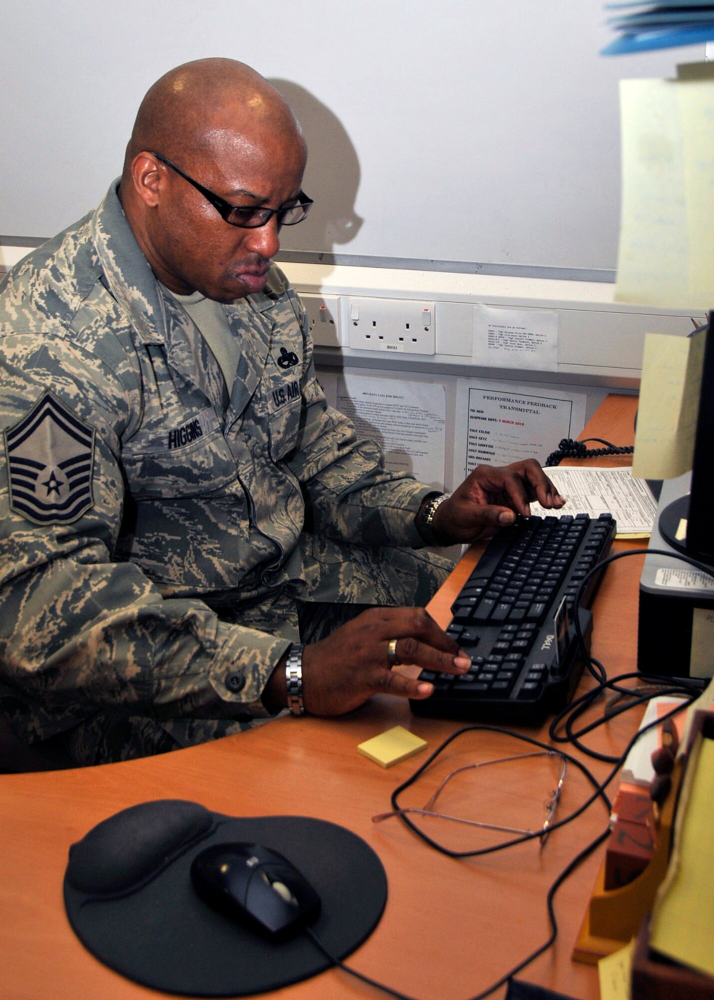 Senior Master Sgt. Steven Higgins, 48th Fighter Wing Inspections Readiness and Exercises superintendent, checks his emails at RAF Lakenheath, England, March 9 after returning from the Senior NCO Academy.  Sergeant Higgins was recognized as the senior NCO of the Year for United States Air Forces in Europe and now will compete for the 12 Outstanding Airmen of the Year. (U.S. Air Force photo by Airman 1st Class Eboni Knox) 