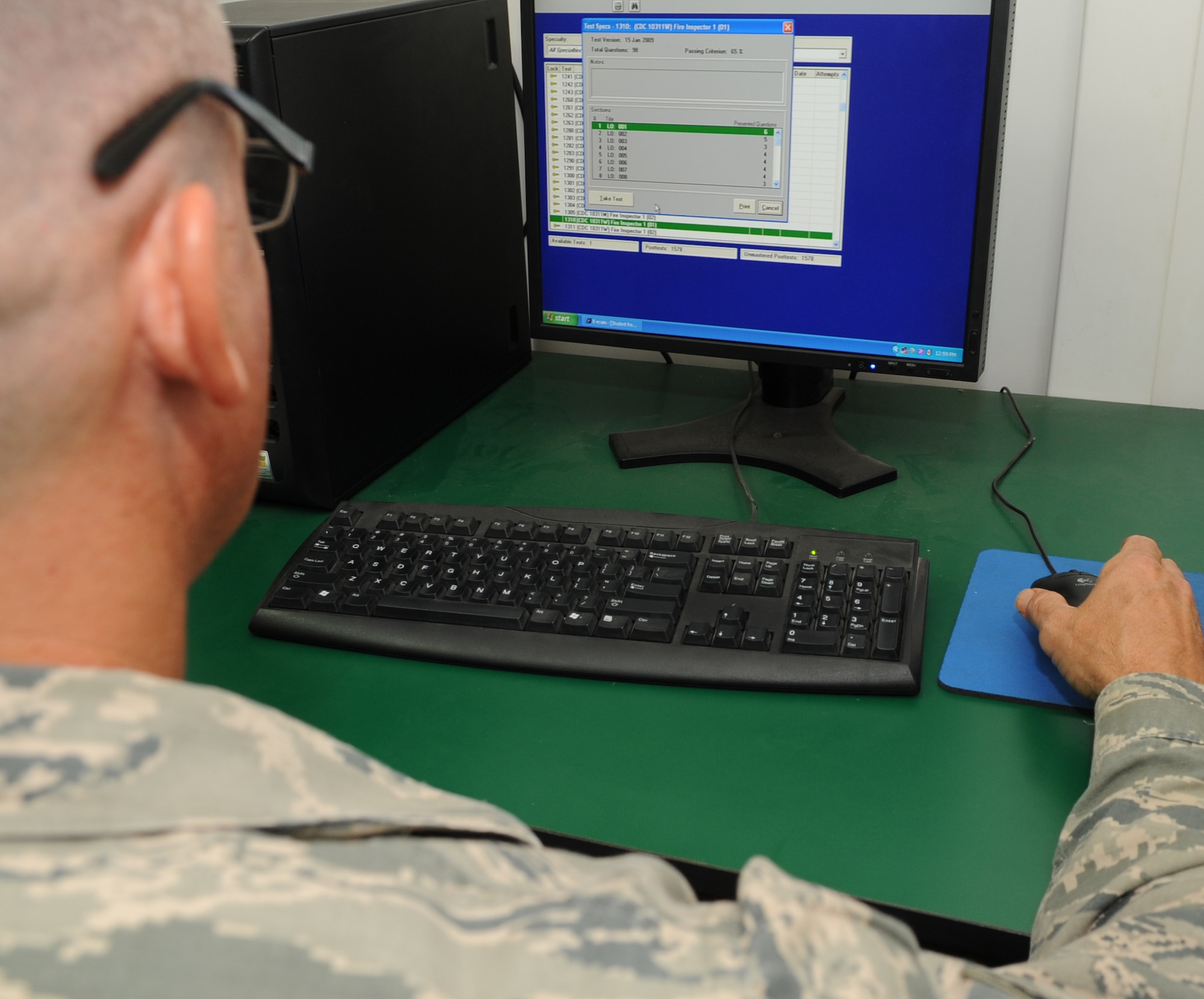 Military members take a variety of exams through the 506th Expeditionary Force Support Squadron Learning Resource Center at Kirkuk Regional Air Base, Iraq on April 7, 2010.  The center offers development courses, professional military education services, various DANTES and college level entrance examinations. (U.S. Air Force photo/Staff Sgt. Tabitha Kuykendall/Released)