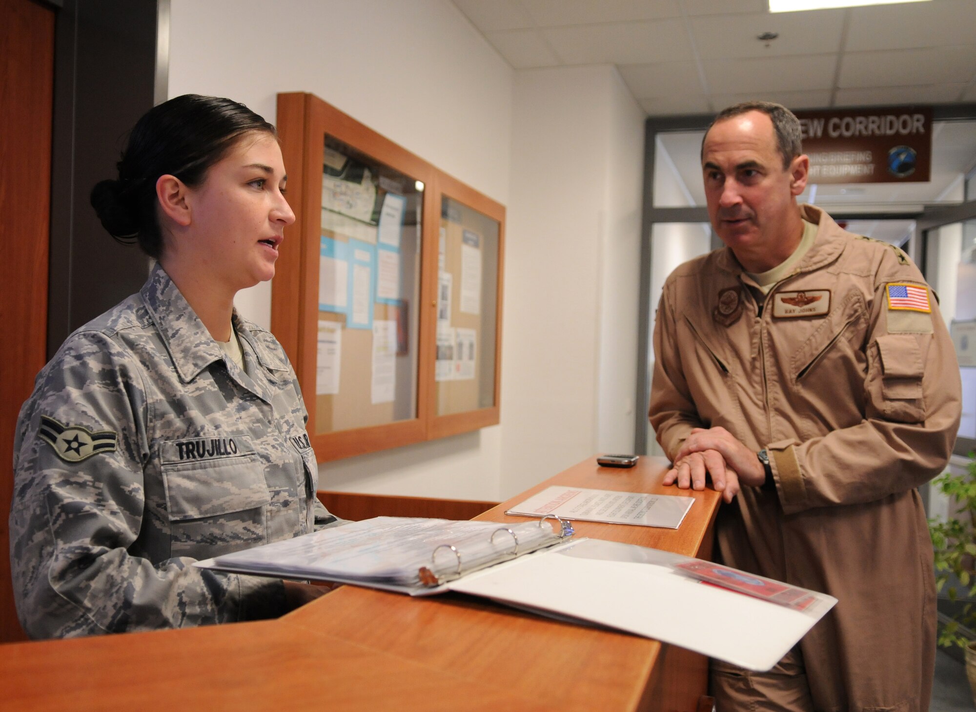 SPANGDAHLEM AIR BASE, Germany -- Airman 1st Class Jill Trujillo, 726th Air Mobility Squadron air mobility control center controller, briefs her job responsibilities during Gen. Ray Johns Jr., Air Mobility Command commander's, visit April 6.  During his visit, General Johns  took the opportunity to tour various sections of the 726th AMS and personally meet the Airmen. (U.S. Air Force photo/Senior Airman Nathanael Callon)
