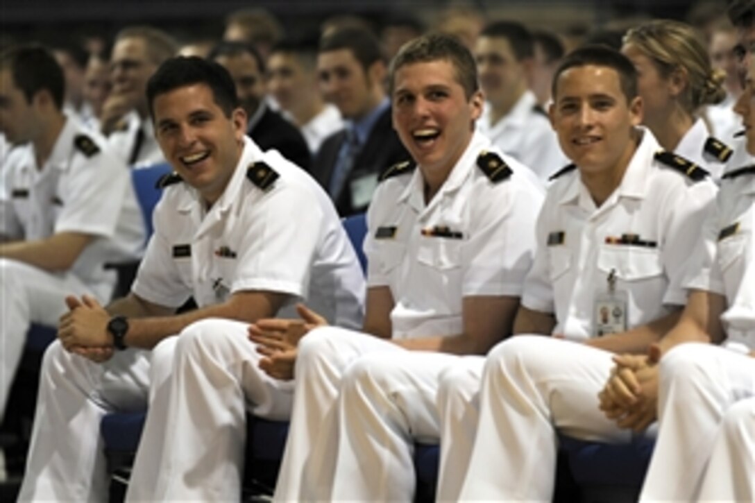 Midshipmen enjoy one of Defense Secretary Robert M. Gates' answers during a question and answer session at the U.S. Naval Academy in Annapolis, Md., April 7, 2010.  Gates emphasized to the future Navy and Marine Corps officers that while he wasn’t endorsing all of their methods, past leaders such as Marine Lt. Gen. Victor Krulak and Navy Adm. Hyman Rickover had the kind of courage that today’s military leaders need. 
 