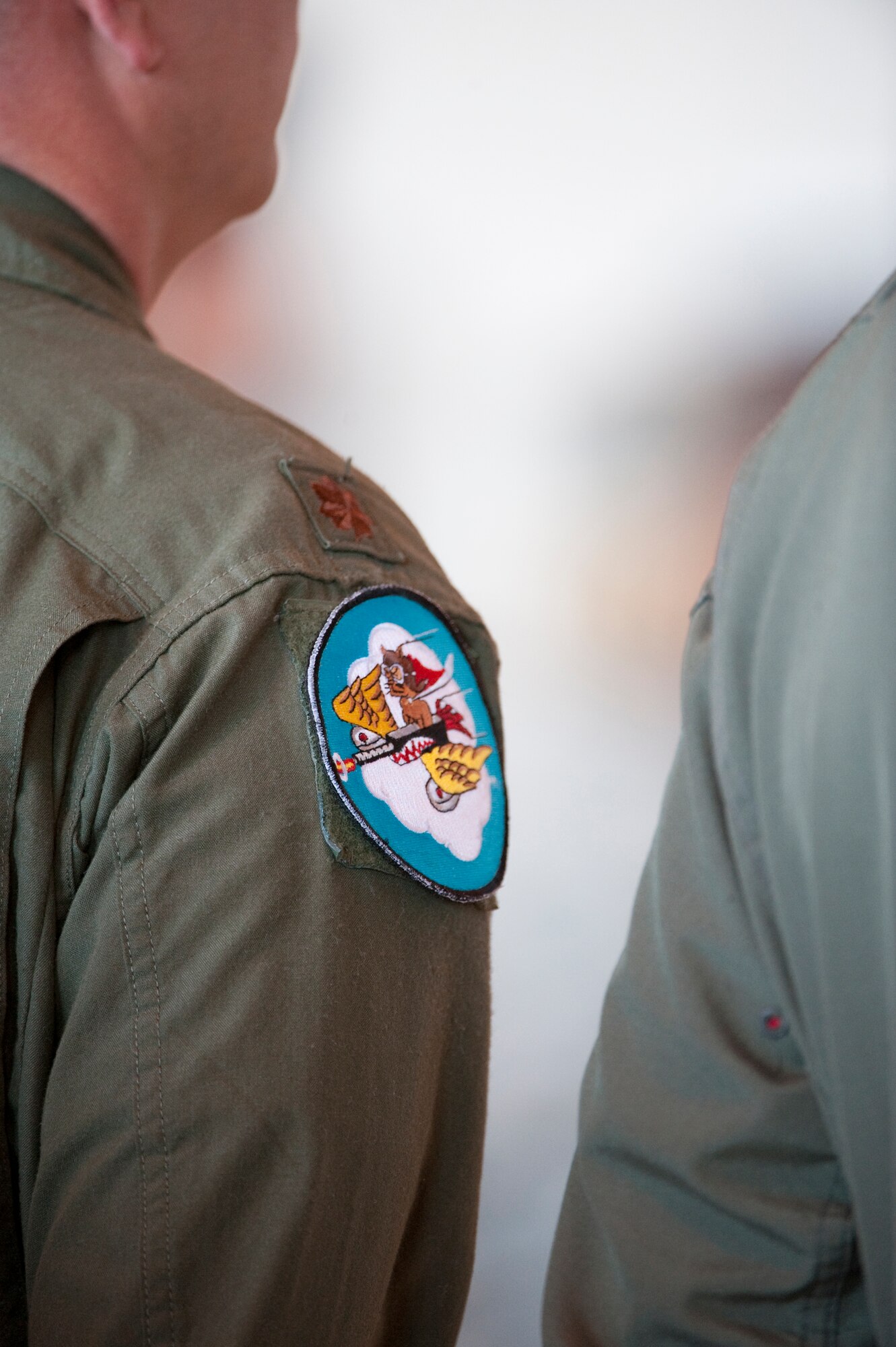 HOLLOMAN AIR FORCE BASE, N.M. -- A U.S. Air Force major assigned to the 301st Fighter Squadron stands in formation during the 44th Fighter Group activation ceremony April 9, 2010. The 44th Fighter Group traces its lineage to the famed World War II 44th Bombardment Group (Heavy) originally activated in January 1941 at MacDill Army Air Field in Tampa, Fla., and flew the then state-of-the-art B-24 Liberator. Sixty-nine years later, the 44th Fighter Group is the only Air Force Reserve organization to be selected to fly the U.S. Air Force's premier air superiority fighter, the F-22 Raptor. (U.S. Air Force photo by Staff Sgt. Joe Laws / Released)