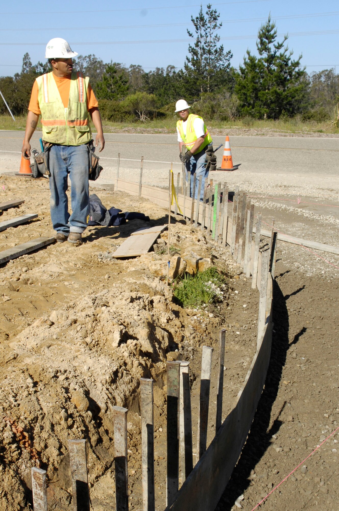 VANDENBERG AIR FORCE BASE, Calif. – The Rockwood Construction Company was hired to re-pave the parking lot at the Communications and Public Affairs building 12000 Thursday, April 8, 2010. The workers must do patch work on the foundation before the re-paving begins. (U.S. Air Force photo/Staff Sgt. Scottie T. McCord)