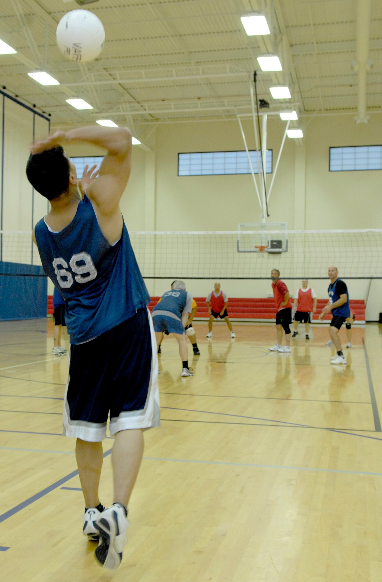 VANDENBERG AIR FORCE BASE, Calif. -- To ensure the serve makes it up and over the net, Ace Tapang, from the 18th Intelligence Squadron team, slaps the ball with power during an intramural volleyball game here Wednesday, April 7, 2010. (U.S. Air Force photo/Airman 1st Class Andrew Lee) 
 