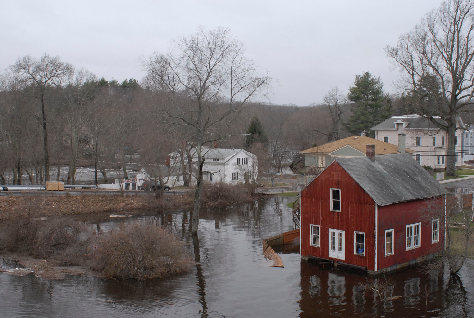 Rain from the days prior to March 31, 2010, devastated homes and roads in Jewett City, Conn. Waters reached four feet deep at the nearby sewer treatment plant requiring the National Guard to be called up to aid in pumping the water back into the Quinebaug River. (U.S. Air Force photo by Tech. Sgt. Joshua Mead)