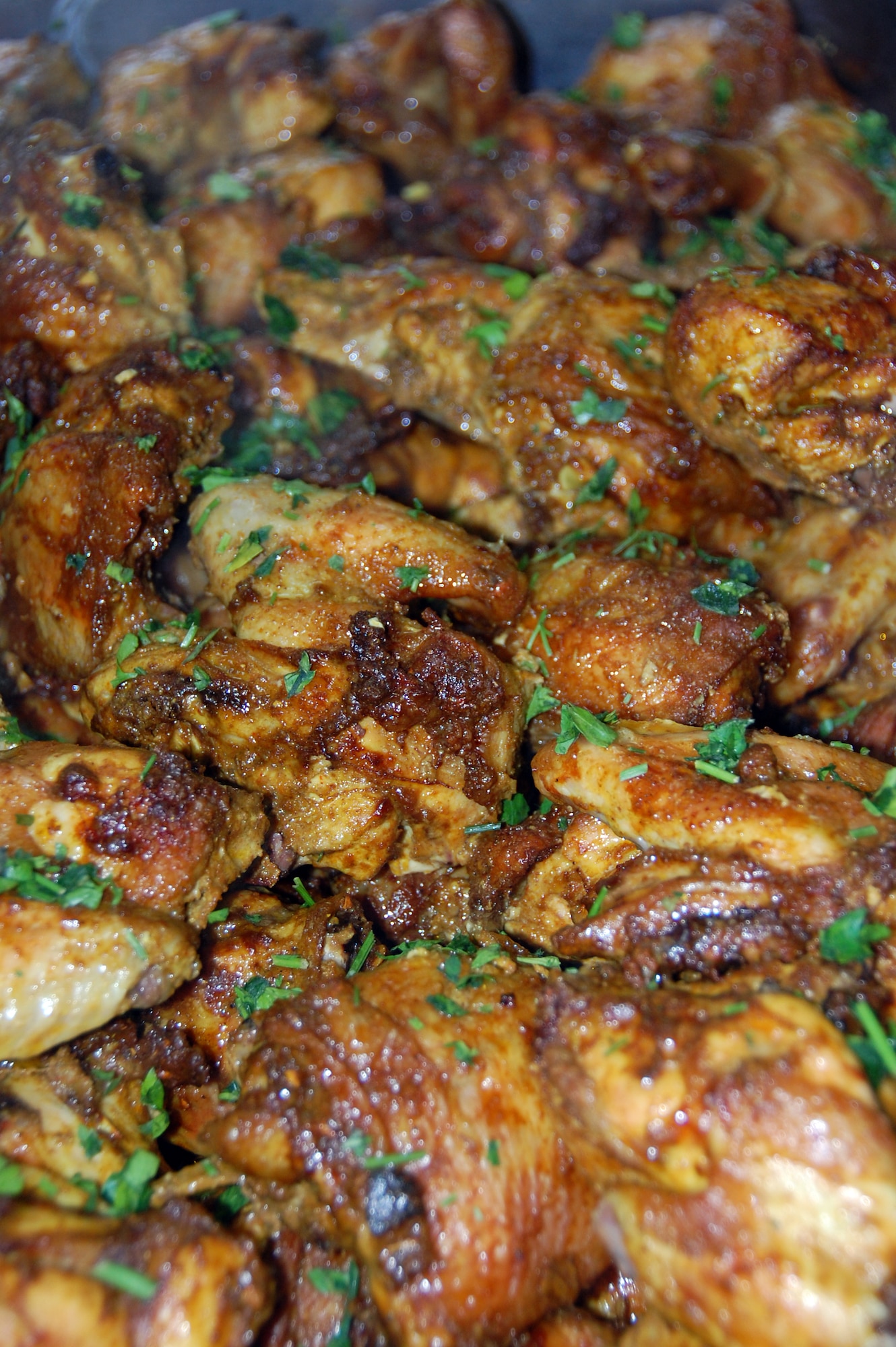 Chicken Tikka, an Indian dish, is just one of four menu items members of the 387th Air Expeditionary Group learned how to prepare during a cooking class held by the Falcon Cafe staff April 6, 2010, at an air base in Southwest Asia. (U.S. Air Force photo/Tech. Sgt. Lindsey Maurice)