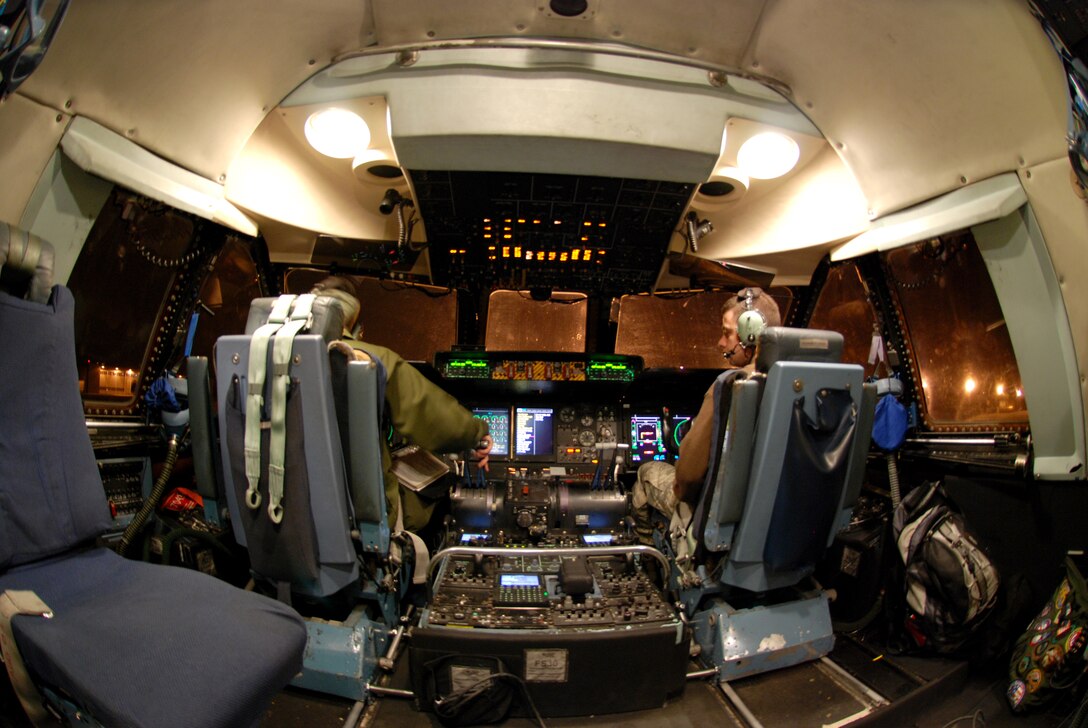 Master Sgt. Arthur Needham and Senior Airman Arthur Brown, both with 439th Aircraft Maintenance Squadron, perform a power engine run on a C-5 during the night time hours at Westover Air Reserve Base, Mass.